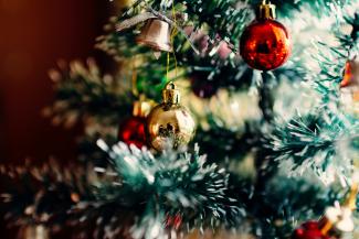 bauble balls hang on christmas tree by Rodion Kutsaiev courtesy of Unsplash.